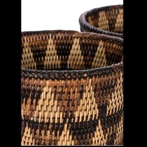 handwoven candle jar showcases geometric
pattern in rich and colorful designs